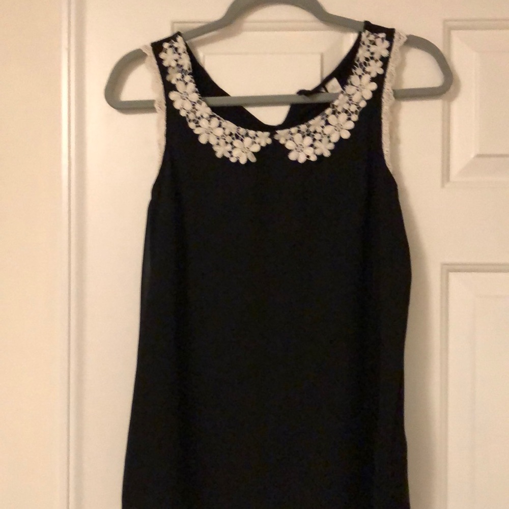 Black sleeveless blouse